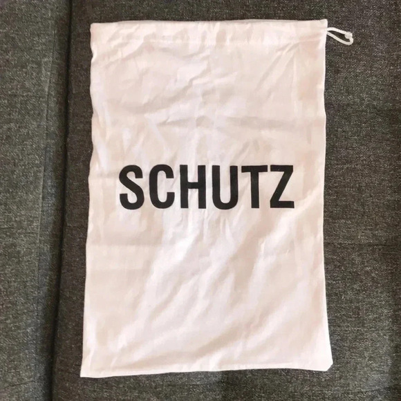 The Upside and Schutz Dust Bags - Picture 2 of 3